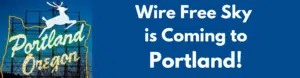 Annoucement that Wire Free Sky is coming to Portland Oregon with famous neon Portland image with leaping deer.